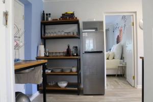 Kuchyň nebo kuchyňský kout v ubytování Sunset Cottage - Cheerful 1 Bedroom Cottage