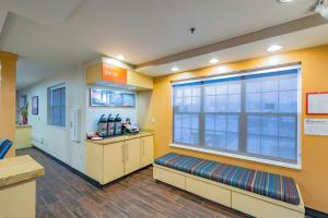 a waiting room at a hospital with a large window at TownePlace Suites Cleveland Streetsboro in Streetsboro