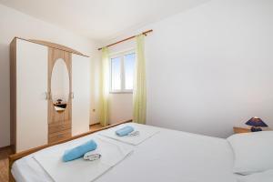 Łóżko lub łóżka w pokoju w obiekcie Nice Apartment Silvia