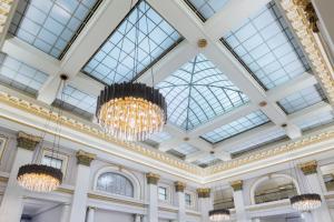 a large room with chandeliers and windows at The Westin Great Southern Columbus in Columbus