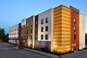 a rendering of a building in a parking lot at Fairfield Inn & Suites by Marriott Asheville Airport/Fletcher in Fletcher