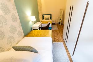 Postel nebo postele na pokoji v ubytování Luxury Suite / Karlo Paržik