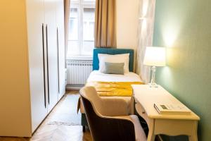 Postel nebo postele na pokoji v ubytování Luxury Suite / Karlo Paržik