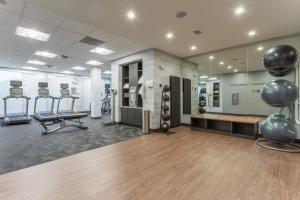 a gym with treadmills and exercise equipment and a mirror at Fairfield Inn & Suites Franklin in Franklin