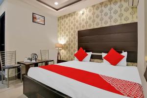 Postel nebo postele na pokoji v ubytování The Abhinandan + 32 fotografií