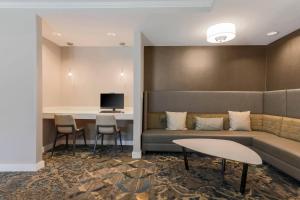 a living room with a couch and a table at Residence Inn by Marriott Denver Golden/Red Rocks in Golden