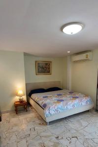 Postel nebo postele na pokoji v ubytování Tientong Guesthouse
