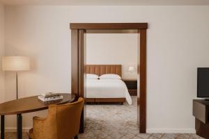 Posteľ alebo postele v izbe v ubytovaní Sheraton Poznan Hotel