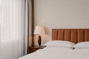 Posteľ alebo postele v izbe v ubytovaní Sheraton Poznan Hotel