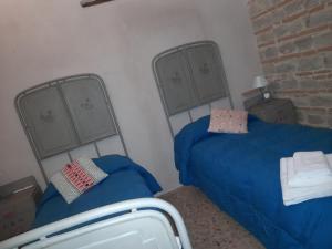 Vuode tai vuoteita majoituspaikassa Il Vicoletto di BIBI - B&B