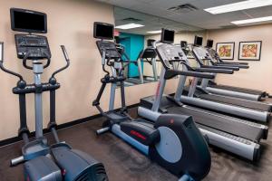 a row of cardio machines in a gym at Fairfield Inn & Suites by Marriott Atlanta Buckhead in Atlanta