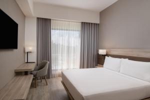 Voodi või voodid majutusasutuse AC Hotel by Marriott Punta Cana toas