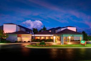 a rendering of a house at night at Courtyard Dayton South Mall in Miamisburg