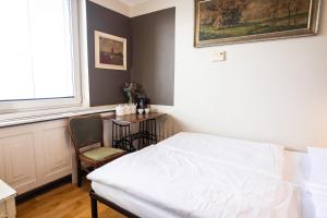 Letto o letti in una camera di Sir Toby's Hostel