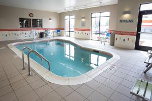 a large swimming pool in the middle of a building at Fairfield Inn & Suites by Marriott Moscow in Moscow