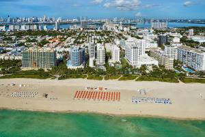 an aerial view of a beach and a city at Royal Palm South Beach Miami, a Tribute Portfolio Resort in Miami Beach