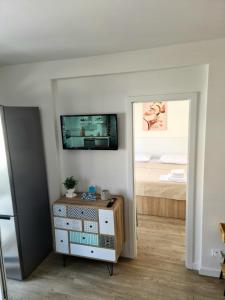 TV a/nebo společenská místnost v ubytování Apartman Marko