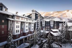 a group of buildings with snow on the ground at Marriott's MountainSide in Park City