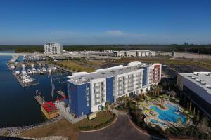 an aerial view of a hotel and a marina at SpringHill Suites Orange Beach at The Wharf in Orange Beach