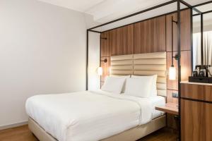 Postel nebo postele na pokoji v ubytování AC Hotel by Marriott Stockholm Ulriksdal