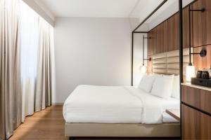 Postel nebo postele na pokoji v ubytování AC Hotel by Marriott Stockholm Ulriksdal