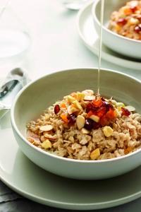 a bowl of rice with sauce being poured on it at Fairfield Inn by Marriott Toronto Oakville in Oakville