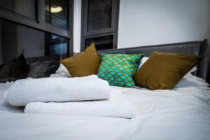 Llit o llits en una habitació de Sea View Boutique Apartment