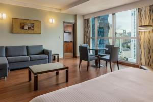 Rúm í herbergi á Marriott Executive Apartments Panama City, Finisterre