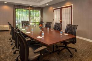 a conference room with a long table and chairs at SpringHill Suites Centreville Chantilly in Centreville