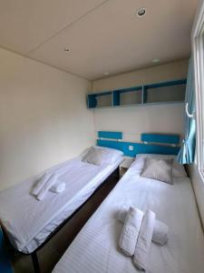 Voodi või voodid majutusasutuse Borić Mobile Homes in Bijela Uvala and Zelena Laguna toas