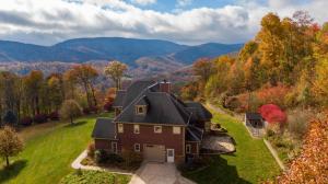 an aerial view of a home in the mountains at Mountain Gem in Boone
