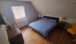 Postel nebo postele na pokoji v ubytování Haus Erdmann