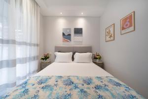 Postel nebo postele na pokoji v ubytování Medusa Luxury Apartments