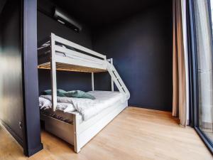 Krevet ili kreveti na sprat u jedinici u okviru objekta Maison RuRee super modern and luxuriously finished near Somme-Leuze