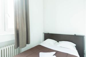 Postel nebo postele na pokoji v ubytování Hôtel Le Paris Brest + 8 fotografií