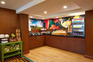 a fast food restaurant with a counter with food at Fairfield Inn by Marriott Rochester East in Webster