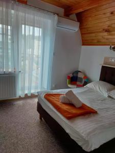 Posteľ alebo postele v izbe v ubytovaní "Hel" Wieniec Zdrój