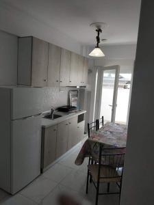 Kuchyň nebo kuchyňský kout v ubytování First line apartment