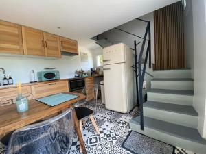 Kuchyň nebo kuchyňský kout v ubytování Tiny House Sedan
