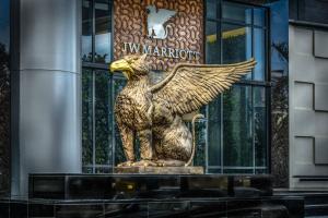 a statue of an eagle in front of a building at JW Marriott Hotel Santo Domingo in Santo Domingo