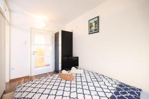 Apartman Cruiser客房内的一张或多张床位