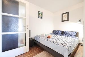 Apartman Cruiser客房内的一张或多张床位