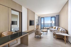 A seating area at Four Points by Sheraton Wuchuan, Loong Bay
