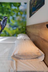 Postel nebo postele na pokoji v ubytování Hotel de Stoppelberg