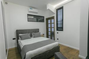 Postel nebo postele na pokoji v ubytování Luxe Apartment in Center
