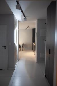 Łóżko lub łóżka w pokoju w obiekcie Exclusive Marina Apartment