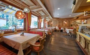 Restoran või mõni muu söögikoht majutusasutuses Apart-Hotel Forellenhof