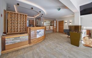 TV a/nebo společenská místnost v ubytování Apart-Hotel Forellenhof