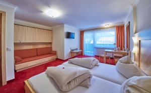 Voodi või voodid majutusasutuse Apart-Hotel Forellenhof toas
