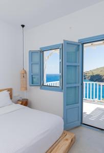 Postel nebo postele na pokoji v ubytování Ihthioessa Boutique Hotel + 37 fotografií